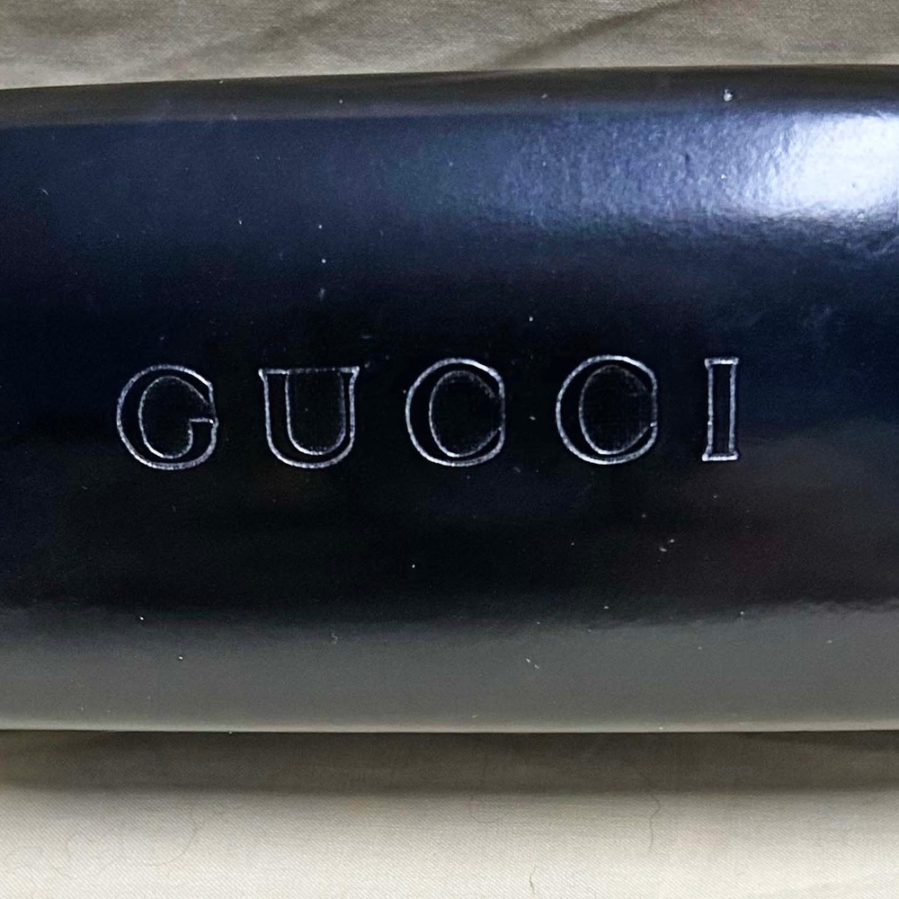 GUCCI GLASSES CASE, HARD-SIDED, VELVET INTERIOR, GUCCI NAME OUTSIDE AND INSIDE,